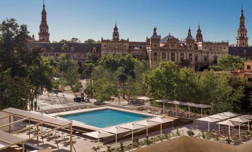 Ad for best hotels with pools in Seville